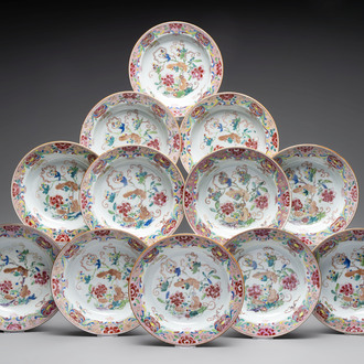 A set of 12 Chinese famille rose plates with squirrels among grapes and peonies, Qianlong