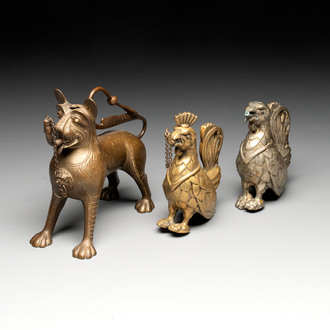 A bronze lion-form aquamanile and two rooster-form aquamanilia, one chromed, Germany, 19th C.