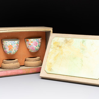 A pair of Chinese famille rose 'millefleurs' cups with a presentation box, Jiaqing mark, Republic