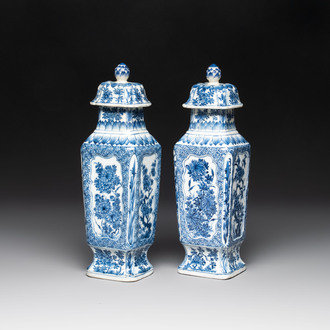 A pair of Chinese blue and white square vases and covers with floral design, Kangxi