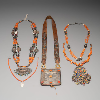 A varied group of four Islamic necklaces and a Quran holder, 19th C.