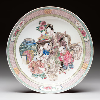 A fine Chinese famille rose ruby-back 'lady and boys' eggshell plate, Yongzheng