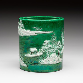 A Chinese verte biscuit 'riverscape' brush pot, artemisia leaf mark, 19th C.
