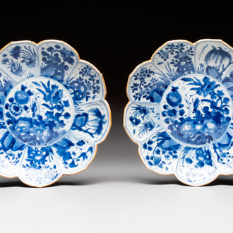 A pair of Chinese blue and white lotus-form 'Grasshopper' plates, Kangxi