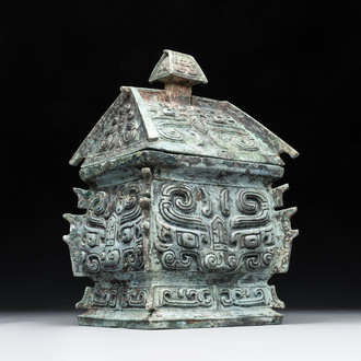 A Chinese archaic bronze inscribed wine vessel with buffalo design, 'fangyi 方彝', Western Zhou
