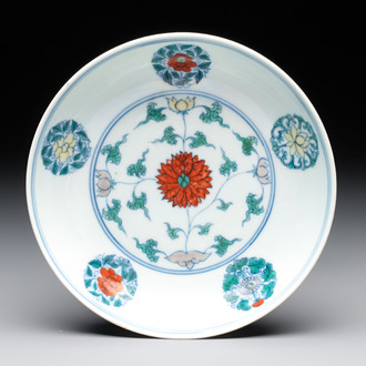 A Chinese doucai plate with stylised floral design, Chenghua mark, Kangxi/Yongzheng