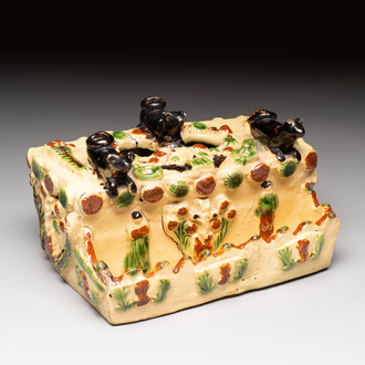 A polychrome-glazed inkwell with relief design, possibly Italy or France, 18/19th C.