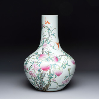 A Chinese famille rose 'nine peaches' 'tianqiuping' vase, Qianlong mark, 19/20th C.