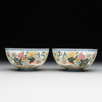 A pair of Chinese famille rose eggshell bowls with floral design, Qianlong mark, 20th C.