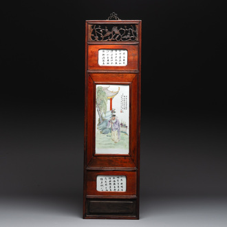 A Chinese carved wooden panel with famille rose plaques in the style of Wang Qi 王琦, dated 1932