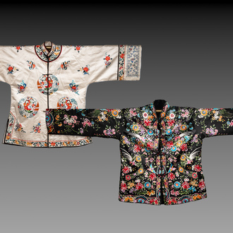 Two Chinese embroidered silk women's robes, 20th C.
