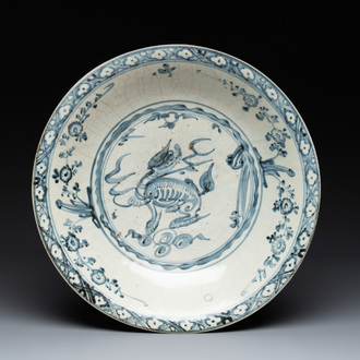 A Chinese Swatow blue and white 'qilin' dish, Ming