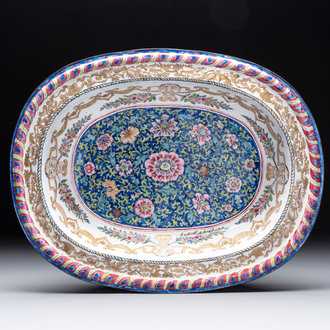 A large Chinese Canton enamel basin with garlands decorated with male heads, Qianlong