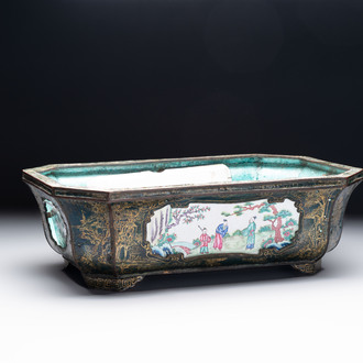 A Chinese Canton enamel gilt-decorated dark-green-ground jardinière with four inserted plaques, Qianlong/Jiaqing