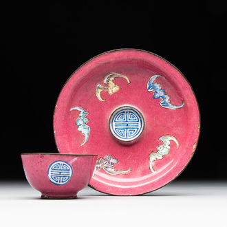 A rare Chinese Canton enamel ruby-ground 'Bats and Shou' cup on stand, Qianlong mark and of the period