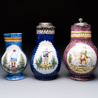 Three Brussels faience jugs, two with pewter mounts, 19/20th C.
