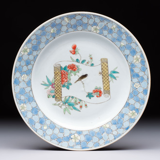 A Chinese famille rose ruby-back plate with a bird on a blossoming branch, Yongzheng