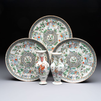Three Chinese Canton famille verte plates and two famille rose wall pocket vases, 19th C.