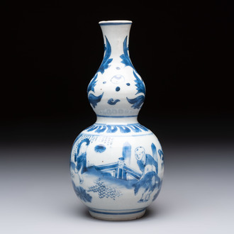 A Chinese blue and white 'playing boys' double gourd vase, Transitional period