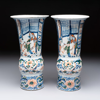 A pair of unusual polychrome Dutch Delft Kangxi-style chinoiserie beaker vases, early 18th C.