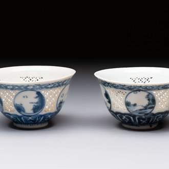 A pair of reticulated Chinese blue and white 'Hatcher Cargo' shipwreck bowls, Transitional period