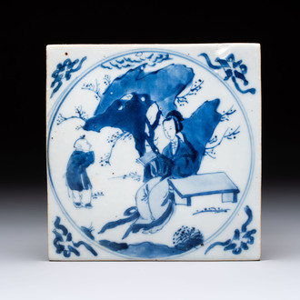 A Chinese blue and white 'elegant beauty and boy' tile, Kangxi