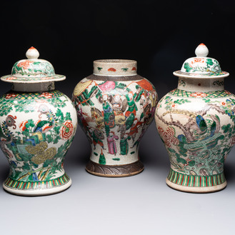 Two Chinese Nanking famille verte covered vases and a famille rose vase, 19th C.