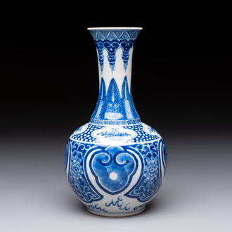 A Chinese blue and white vase with floral design, 19th C.