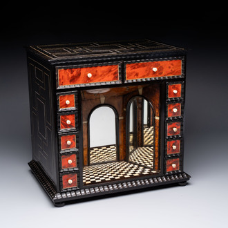 A small tortoiseshell-veneered cabinet of drawers with mirrored interior, Antwerp, 17th C.