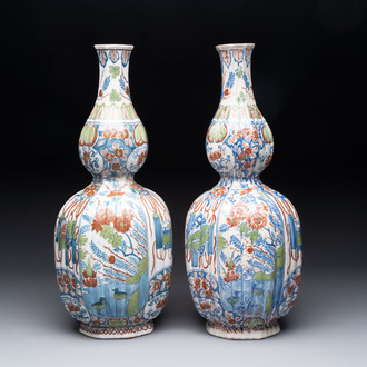 A pair of polychrome Dutch Delft double gourd vases, 19th C.