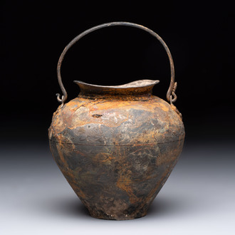 A rare Chinese parcel-gilt silver handled jar with floral scroll design, Tang