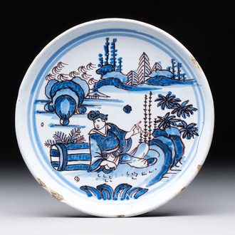 A blue, white and manganese Nevers Transitional style chinoiserie dish, France, 17th C.