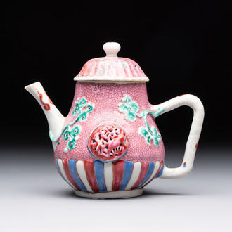 A Chinese famille rose frogspawn-ground relief-molded teapot and cover, Yongzheng