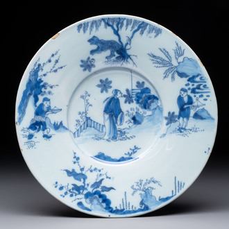 A blue and white Dutch Delft chinoiserie plate, 17th C.