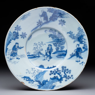 A blue and white Dutch Delft chinoiserie plate, 17th C.