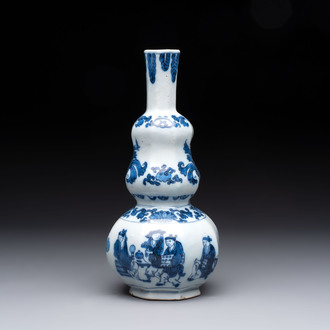 A blue and white Dutch Delft double gourd chinoiserie vase, 17th C.