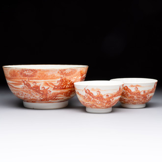 A Chinese iron-red-decorated 'Deer Hunting' bowl and two cups, Qianlong