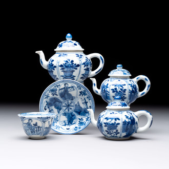 Three Chinese blue and white teapots, a cup and a saucer, Kangxi