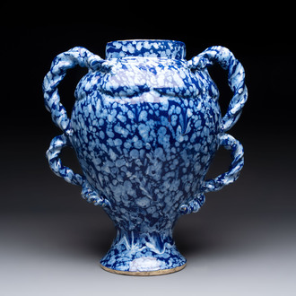 A rare large Nevers white-splashed blue-ground rope twist handled vase with 'à la bougie' decor, France, 17th C.