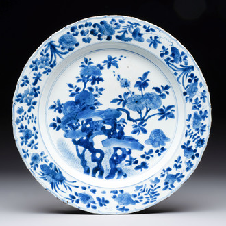 A Chinese blue and white dish with floral design, Kangxi mark and of the period