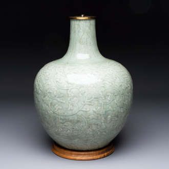 A Chinese celadon-glazed 'lotus scroll' globular vase mounted as lamp, 19th C.