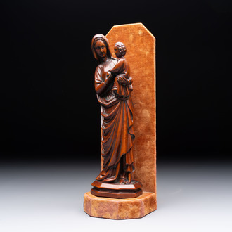 A carved boxwood sculpture of Madonna and Child, France or Italy, 19th C.