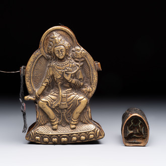 A Tibetan copper Gawu box and tsa tsa mold, 19th C.