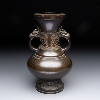 A Chinese archaistic bronze vase with 'mythical beast' handles, Yuan/Ming