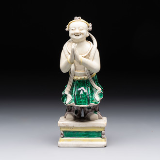 A Chinese sancai-glazed figure of Sudhana, 19th C.