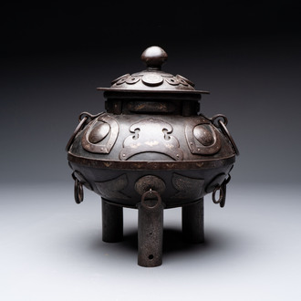 An unusual Chinese gold- and silver-inlaid iron censer and cover, Xuande mark, Ming