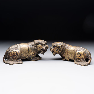 A pair of Chinese bronze Buddhist lions, 19/20th C.