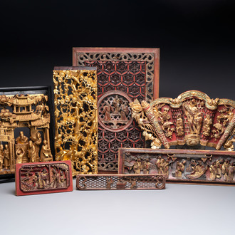 Seven Chinese gilt-lacquered carved wooden panels with narrative design, 19th C.