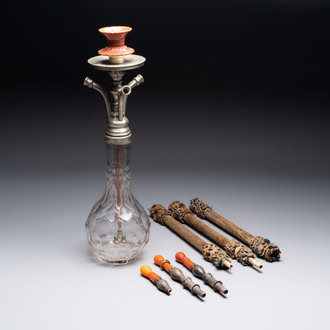 An Ottoman white-metal and Tophane pottery-mounted cut-crystal hookah, with three hose tubes and three amber-mounted mouthpieces, Turkey, 19th C.