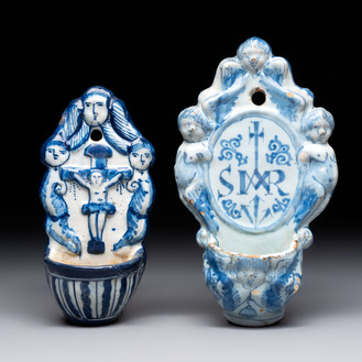Two blue and white Dutch Delft holy water fonts, 17th C.